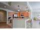 A modern kitchen featuring stainless steel appliances, granite countertops, and an open layout at 11640 N Tatum Blvd # 1095, Phoenix, AZ 85028