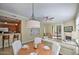 Well-lit open-concept living space that seamlessly combines the dining, kitchen, and living areas at 11640 N Tatum Blvd # 1095, Phoenix, AZ 85028