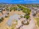 Overhead shot of the park with walking paths, pond, and various recreational areas at 1217 N Miller Rd # 23, Scottsdale, AZ 85257