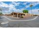 Tan single-story homes with two-car carports, desert landscaping and inviting entrances are shown at 1217 N Miller Rd # 23, Scottsdale, AZ 85257