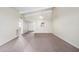 Open-concept living room offers ample space and includes a peek-through to the kitchen and laundry area at 1217 N Miller Rd # 23, Scottsdale, AZ 85257