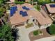 Beautiful home featuring a three car garage, desert landscaping, and solar panels at 12976 W Plum Rd, Peoria, AZ 85383