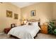 Bright bedroom featuring carpet, furniture, and natural light at 12976 W Plum Rd, Peoria, AZ 85383