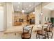 Spacious kitchen featuring wooden cabinets, granite countertops, and modern stainless steel appliances at 12976 W Plum Rd, Peoria, AZ 85383