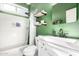 Well-lit bathroom featuring a modern vanity, toilet, and a clean, inviting shower/tub at 1322 S Owl Dr, Gilbert, AZ 85296