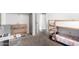 Bright bedroom featuring bunkbeds, closet and wooden furniture at 1322 S Owl Dr, Gilbert, AZ 85296