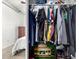Walk-in closet with ample storage, hanging rods, and shelves for organized living at 1322 S Owl Dr, Gilbert, AZ 85296