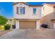 Charming two-story home with a neatly kept driveway and garage at 1322 S Owl Dr, Gilbert, AZ 85296
