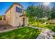 Inviting two story home boasting a lush front lawn and manicured landscaping at 1322 S Owl Dr, Gilbert, AZ 85296
