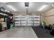 Spacious garage with ample storage, organization, and insulated door at 1322 S Owl Dr, Gilbert, AZ 85296