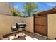 Backyard features a gas BBQ and access door at 13636 N Hamilton Dr # 101, Fountain Hills, AZ 85268