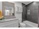 Bathroom features a vanity with granite countertop, and a shower/tub combo with tiled walls at 13636 N Hamilton Dr # 101, Fountain Hills, AZ 85268