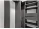 Custom closet features shelving, drawers, and a clothing rod at 13636 N Hamilton Dr # 101, Fountain Hills, AZ 85268