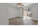 Inviting living area features a ceiling fan and sliding glass doors at 13636 N Hamilton Dr # 101, Fountain Hills, AZ 85268