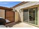 Enclosed back patio with gas BBQ and access door at 13636 N Hamilton Dr # 101, Fountain Hills, AZ 85268