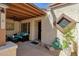 Cozy patio with comfortable seating, decorative lights, and a charming outdoor space at 13636 N Hamilton Dr # 101, Fountain Hills, AZ 85268