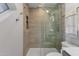 Updated shower features glass enclosure and neutral tile at 13636 N Hamilton Dr # 101, Fountain Hills, AZ 85268
