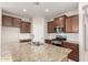 Kitchen with granite countertops, stainless steel appliances and tile backsplash at 14355 W Valentine St, Surprise, AZ 85379
