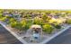 An aerial photograph of the neighborhood park shows play equipment, green space, and picnic tables at 16229 W Berkeley Rd, Goodyear, AZ 85395