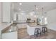 Bright, modern kitchen with granite countertops and stainless steel appliances at 16229 W Berkeley Rd, Goodyear, AZ 85395