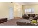 Cozy living room featuring plush seating, a neutral color palette, and a welcoming atmosphere at 16274 N 138Th Ln, Surprise, AZ 85374
