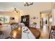 Open dining area featuring updated lighting and easy access to the living room at 17244 W Mohave St, Goodyear, AZ 85338