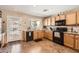 Well-appointed kitchen with stainless steel appliances and granite countertops at 17244 W Mohave St, Goodyear, AZ 85338