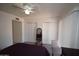 Carpeted bedroom with ceiling fan, closet, and lots of natural light at 1905 E Inverness Ave, Mesa, AZ 85204