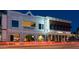 Attractive commercial building exterior with modern architecture, street lighting, and prominent signage at 1905 E Inverness Ave, Mesa, AZ 85204