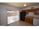 Functional kitchen with wooden cabinets, white appliances and a neutral color palette at 1905 E Inverness Ave, Mesa, AZ 85204