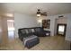 Comfortable living room featuring tile floors, ceiling fan and neutral paint tones for a bright airy feel at 1905 E Inverness Ave, Mesa, AZ 85204