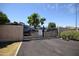 Secured RV lot with a sturdy gate, ensuring safety and peace of mind for vehicle storage at 1905 E Inverness Ave, Mesa, AZ 85204
