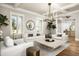 Bright living room featuring hardwood floors, modern decor, and ample seating at 19922 N 101St Pl, Scottsdale, AZ 85255