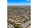 Aerial view of the neighborhood with lush desert landscaping at 20426 N Alma Dr, Maricopa, AZ 85138