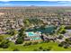 Community amenities include a pond, swimming pools and walking trails at 20426 N Alma Dr, Maricopa, AZ 85138