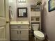 Cozy bathroom featuring a toilet, vanity, mirror, and natural light, creating a relaxing atmosphere at 20426 N Alma Dr, Maricopa, AZ 85138