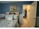 Comfortable bedroom featuring a walk-in closet for optimal storage and organization at 20426 N Alma Dr, Maricopa, AZ 85138