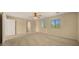 Bright, airy bedroom with hardwood floors, ample natural light, and a relaxing ambiance at 20426 N Alma Dr, Maricopa, AZ 85138