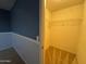 Brightly lit walk-in closet with shelving at 20426 N Alma Dr, Maricopa, AZ 85138