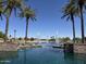 Scenic water feature with fountains providing a peaceful and serene view within the community at 20426 N Alma Dr, Maricopa, AZ 85138