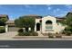 Charming single-Gathering home features a well-maintained lawn and desert landscaping and a tile roof at 20472 W Daniel Pl, Buckeye, AZ 85396