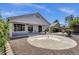 Well-maintained backyard with landscaped areas and a covered patio, ideal for outdoor entertaining at 21616 E Calle De Flores --, Queen Creek, AZ 85142