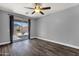 Spacious bedroom features a sliding glass door, ceiling fan, and a private backyard at 21616 E Calle De Flores --, Queen Creek, AZ 85142