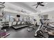 Community fitness center with treadmills, weight machines, and free weights for residents' use at 21616 E Calle De Flores --, Queen Creek, AZ 85142