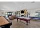 Community game room featuring billiards, shuffleboard, lounge seating, and a TV at 21616 E Calle De Flores --, Queen Creek, AZ 85142