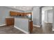 Bright kitchen featuring a breakfast bar, stainless-steel appliances, and wood cabinets at 21616 E Calle De Flores --, Queen Creek, AZ 85142