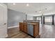 Functional kitchen featuring a stainless steel dishwasher and sink with wood cabinets at 21616 E Calle De Flores --, Queen Creek, AZ 85142
