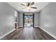 Open living area with sliding glass door, ceiling fan, and backyard access at 21616 E Calle De Flores --, Queen Creek, AZ 85142