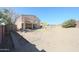 Expansive backyard featuring a pool and ample space for outdoor activities and landscaping potential at 23104 W Kimberly Dr, Buckeye, AZ 85326