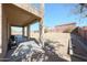 Enjoy this spacious backyard and covered patio with lush greenery at 23104 W Kimberly Dr, Buckeye, AZ 85326